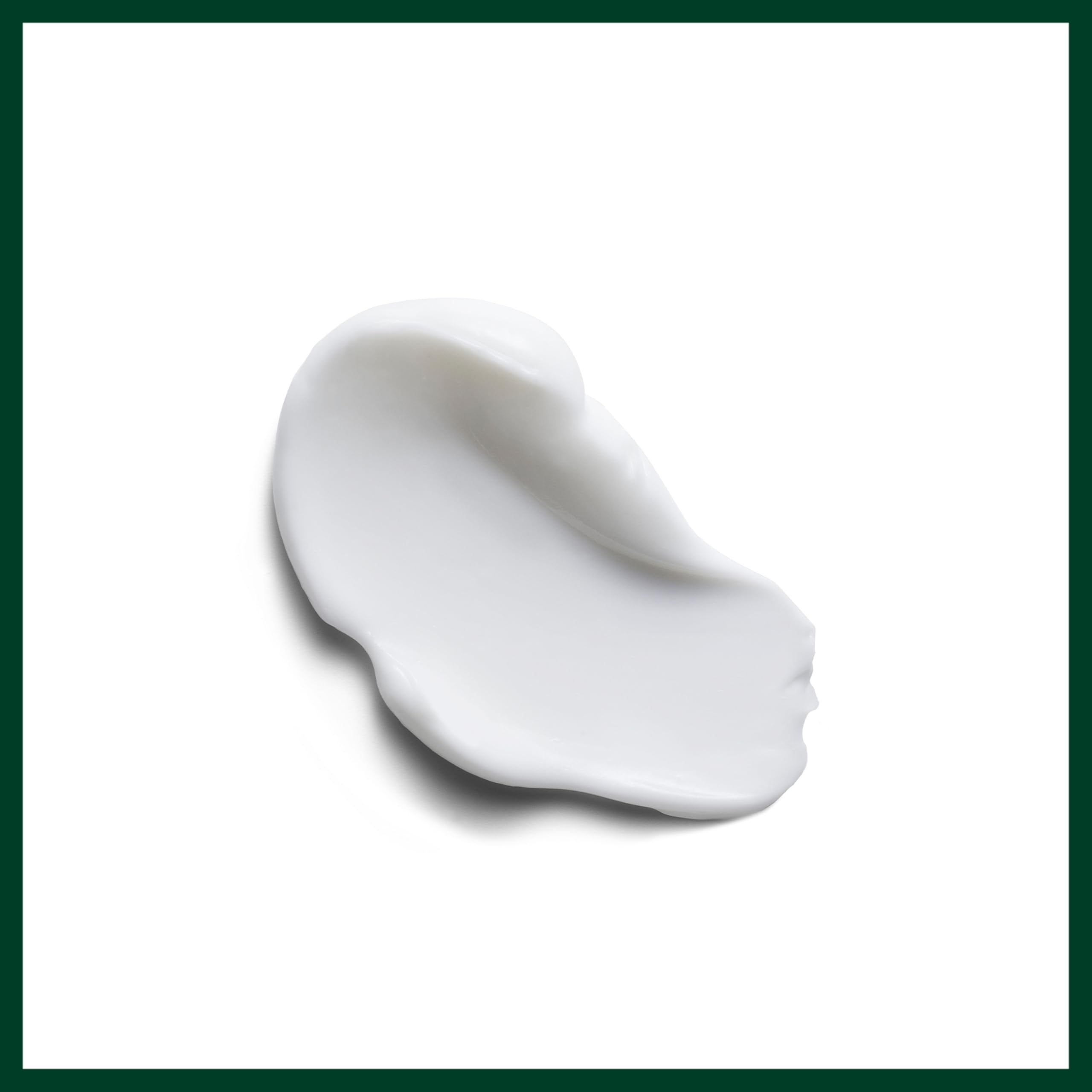 Aveda product beside flat iron illustrating heat protection up to 450°F