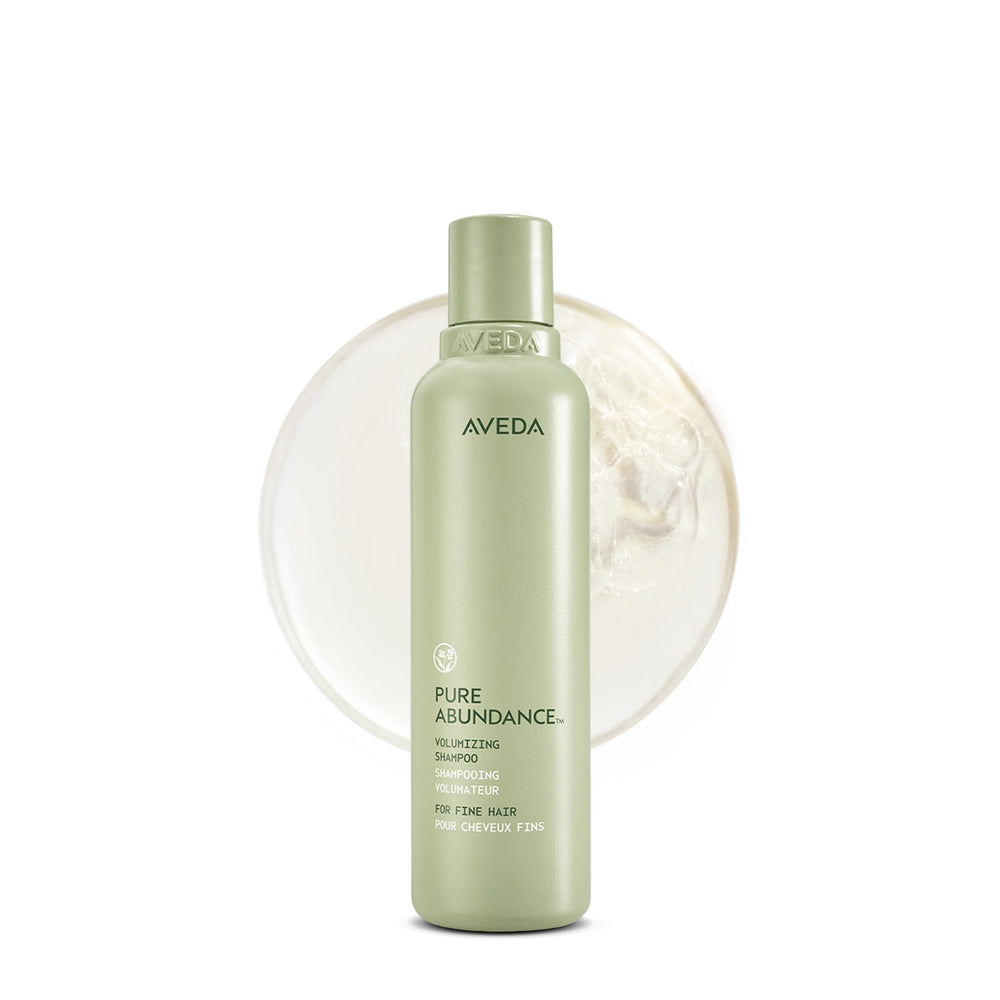 Aveda pure abundance front bottle shows clean branding and volume benefit