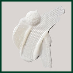 Aveda Shampure bottle in a shower scene showing relaxing botanical ritual