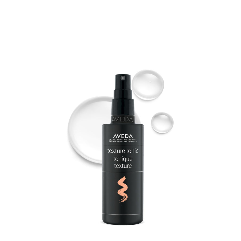 Aveda bottle front view showing texture tonic and compact size for travel