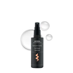 Aveda bottle front view showing texture tonic and compact size for travel