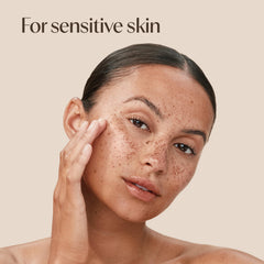 Aveeno close-up ingredient label highlighting oat feverfew hyaluronic acid