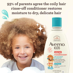 Aveeno Baby label close-up highlighting oat extract and coconut oil benefits