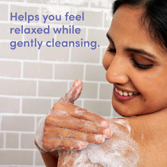Aveeno lather on pouf demonstrating rich foam for gentle cleansing