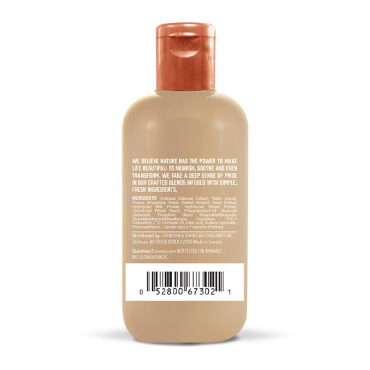 Aveeno oat milk texture pouring to show lightweight, creamy leave-in treatment