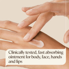 Applying Aveeno ointment to hands for immediate hydration