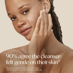 Aveeno rinsed skin in bathroom setting showing soothed, hydrated look