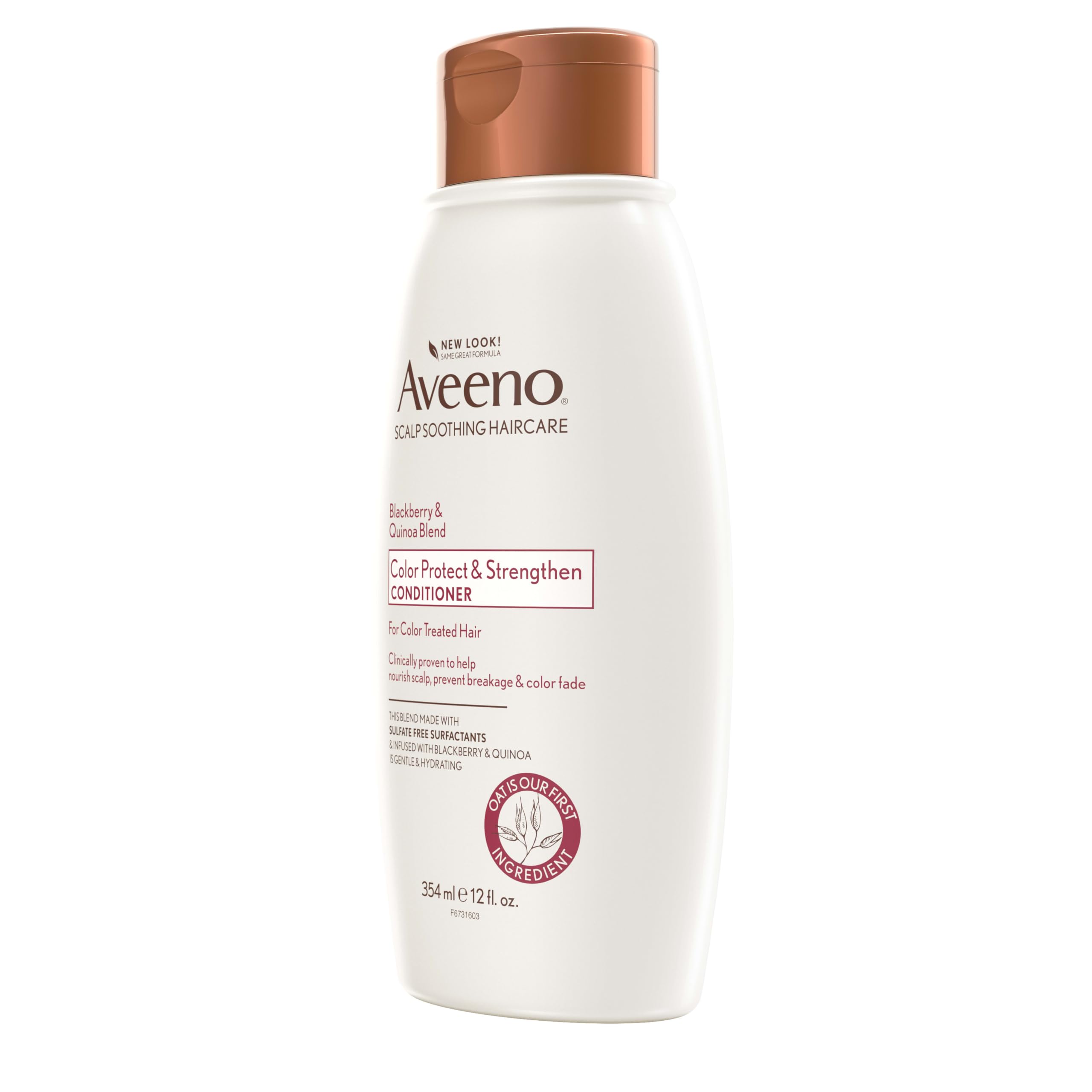 Aveeno 12 fl oz bottle held for size comparison showing travel-friendly volume
