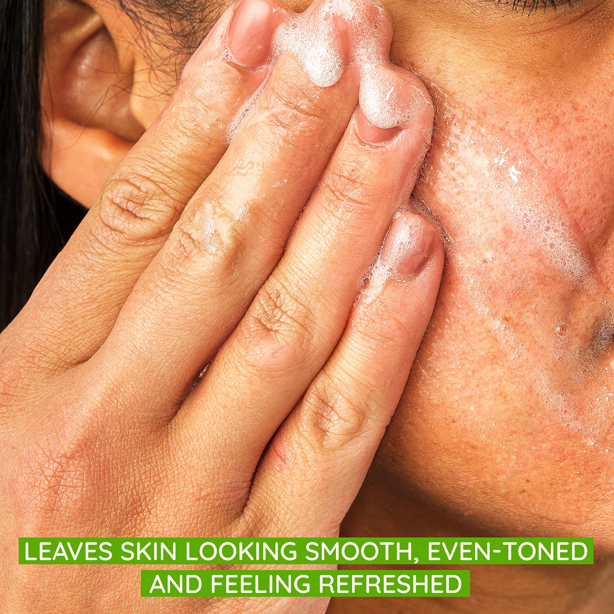 Aveeno close-up of scrub texture showing gentle exfoliating beads for smoothness