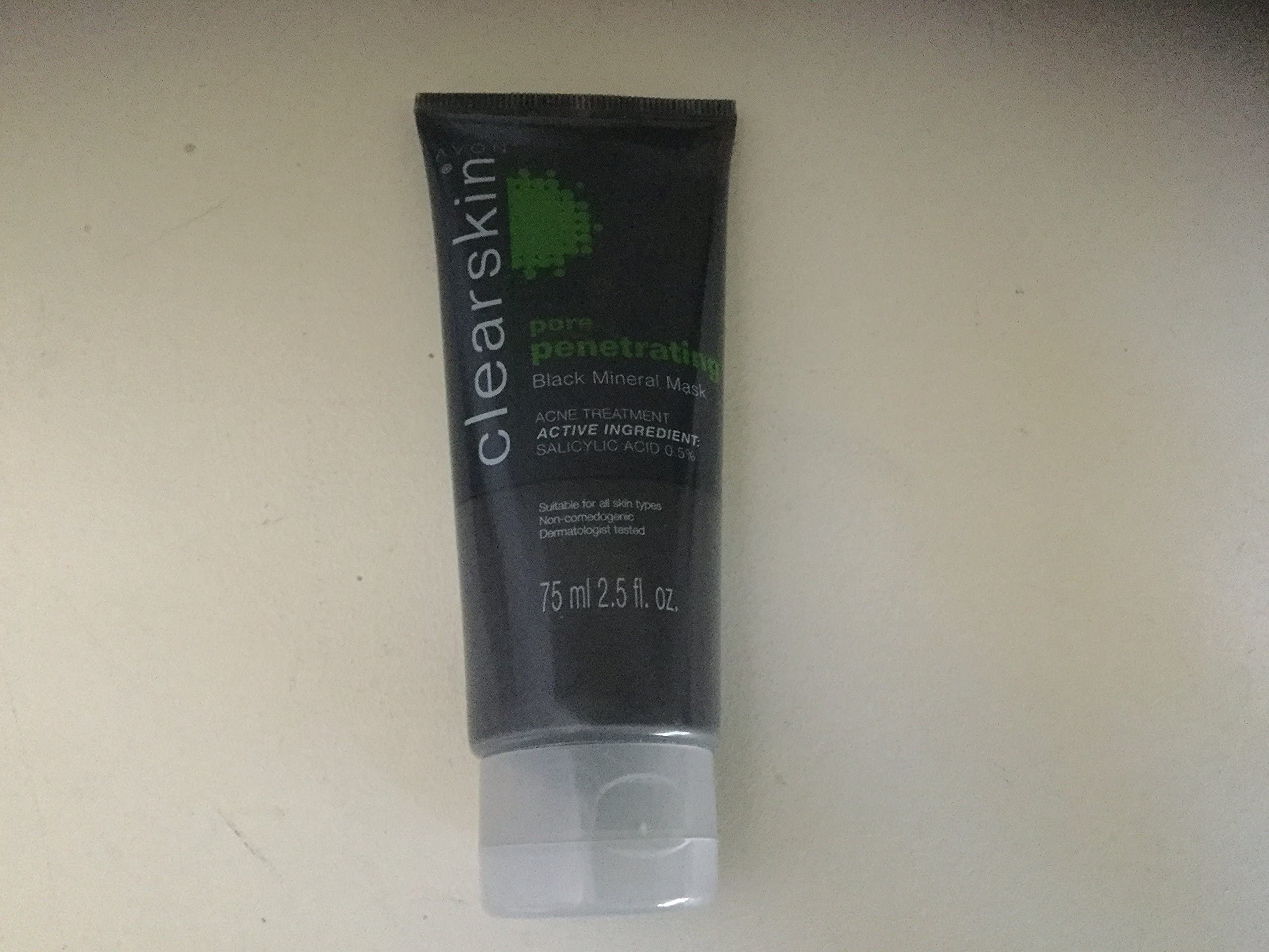 AVON Clearskin texture close-up of smooth black mineral mask, shows creamy consistency