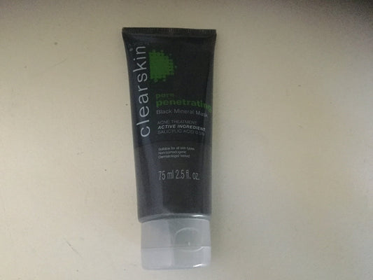 AVON Clearskin texture close-up of smooth black mineral mask, shows creamy consistency