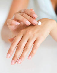 AVON cream applied to hands demonstrating hydration and visible comfort