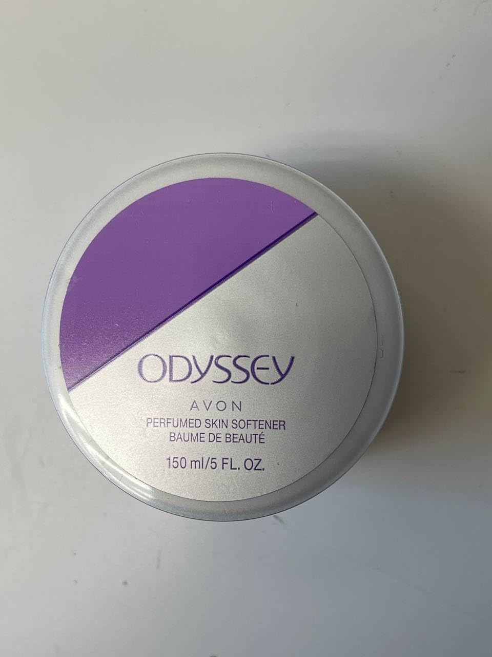 Avon Odyssey jar front view showing elegant label and travel-friendly size