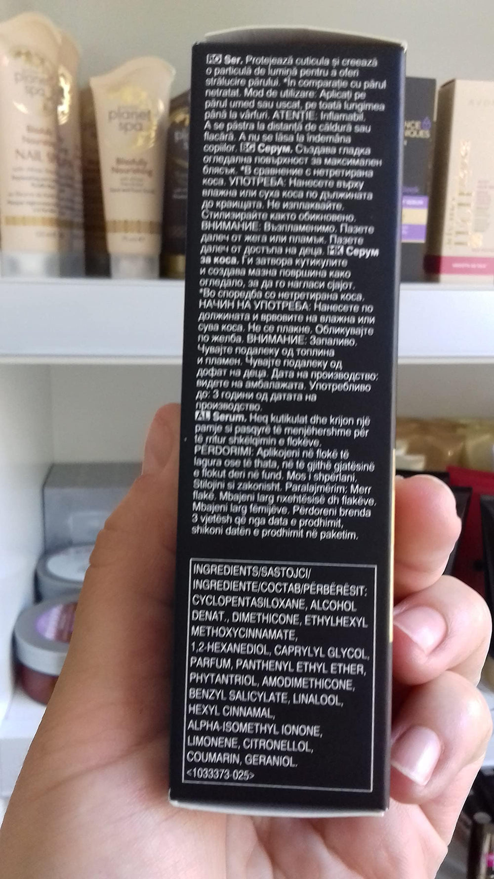AVON stylist applying serum to ends for smoother, shinier hair benefit