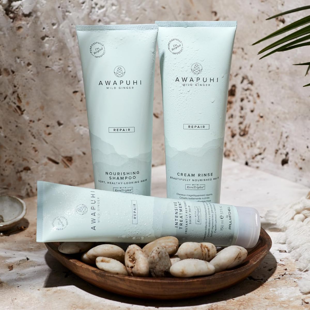 Model with smooth, shiny hair treated with Awapuhi Wild Ginger, illustrates visible softness