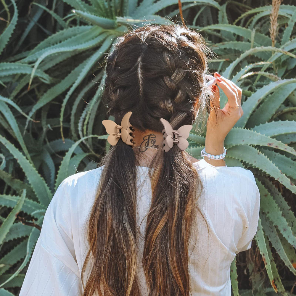 AWAYTR clip secured in hair demonstrating neat half-up styling benefit