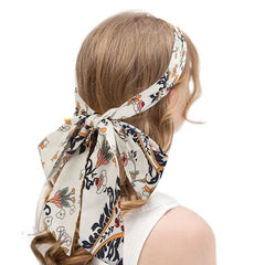 AWAYTR knotted front detail on red wrap highlighting fashion-forward criss-cross hold