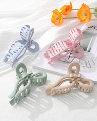 AWAYTR lifestyle image of clips packed for travel, convenient styling on-the-go