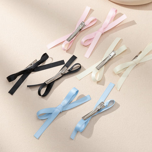 Ayesha close-up of 10mm satin grosgrain ribbon highlighting soft sheen and fine finish