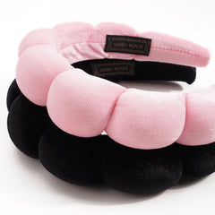 Ayesha close-up of sponge texture highlighting plush comfort and gentle hold