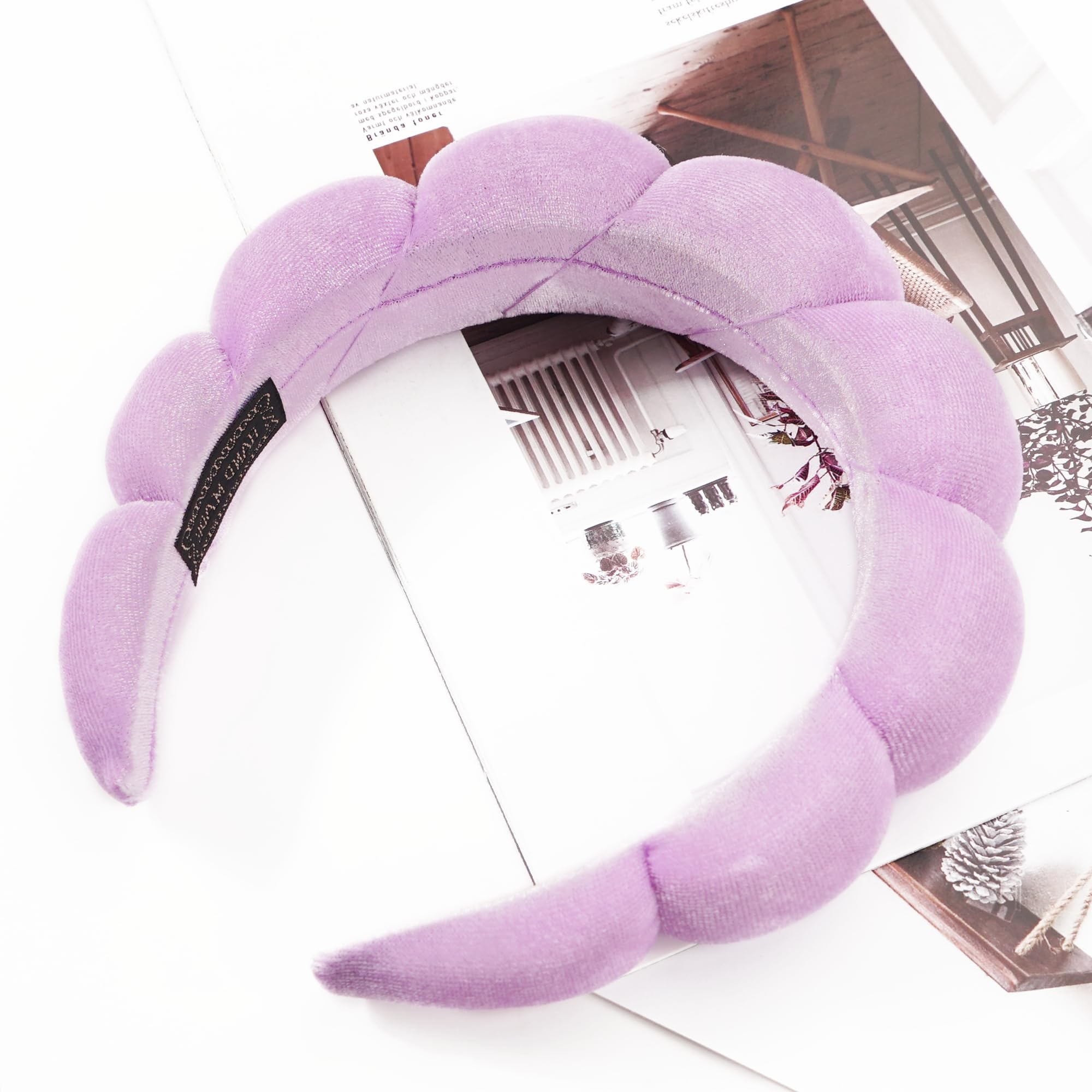 Ayesha headband next to a ruler showing size comparison benefit: one-size-fit flexibility
