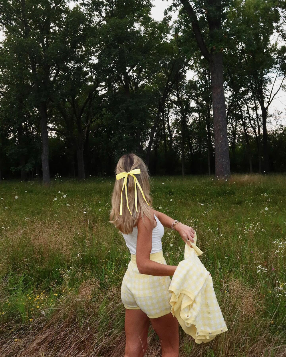 Ayesha in ponytail styling illustrates elegant movement and photo-ready look