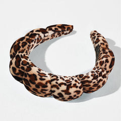 Ayesha set laid flat showing two headbands and wrist cuffs for coordination