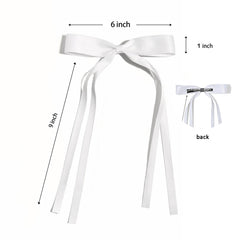 Ayesha bow beside hand showing scale and easy-to-wear size benefit