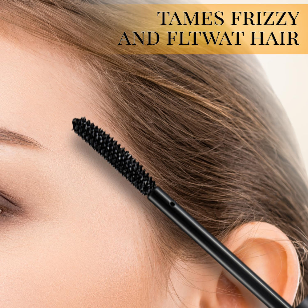 Aymaloy stick on desk next to mirror portraying easy on-the-go styling benefit