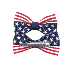 Aysekone bow clipped in hair showing fit and festive styling benefit