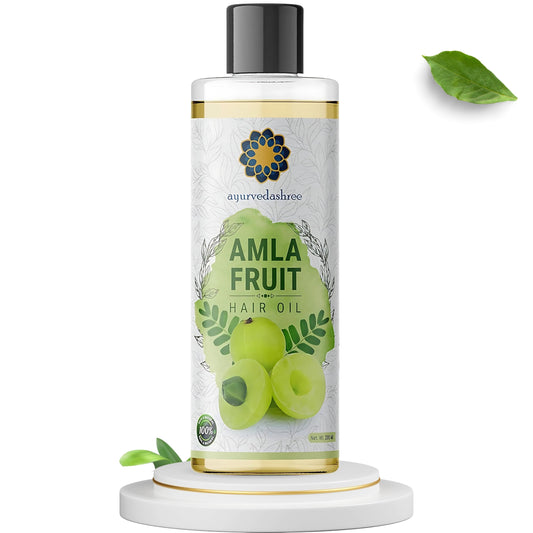 AYURVEDASHREE oil pour close-up highlighting silky texture and nourishment