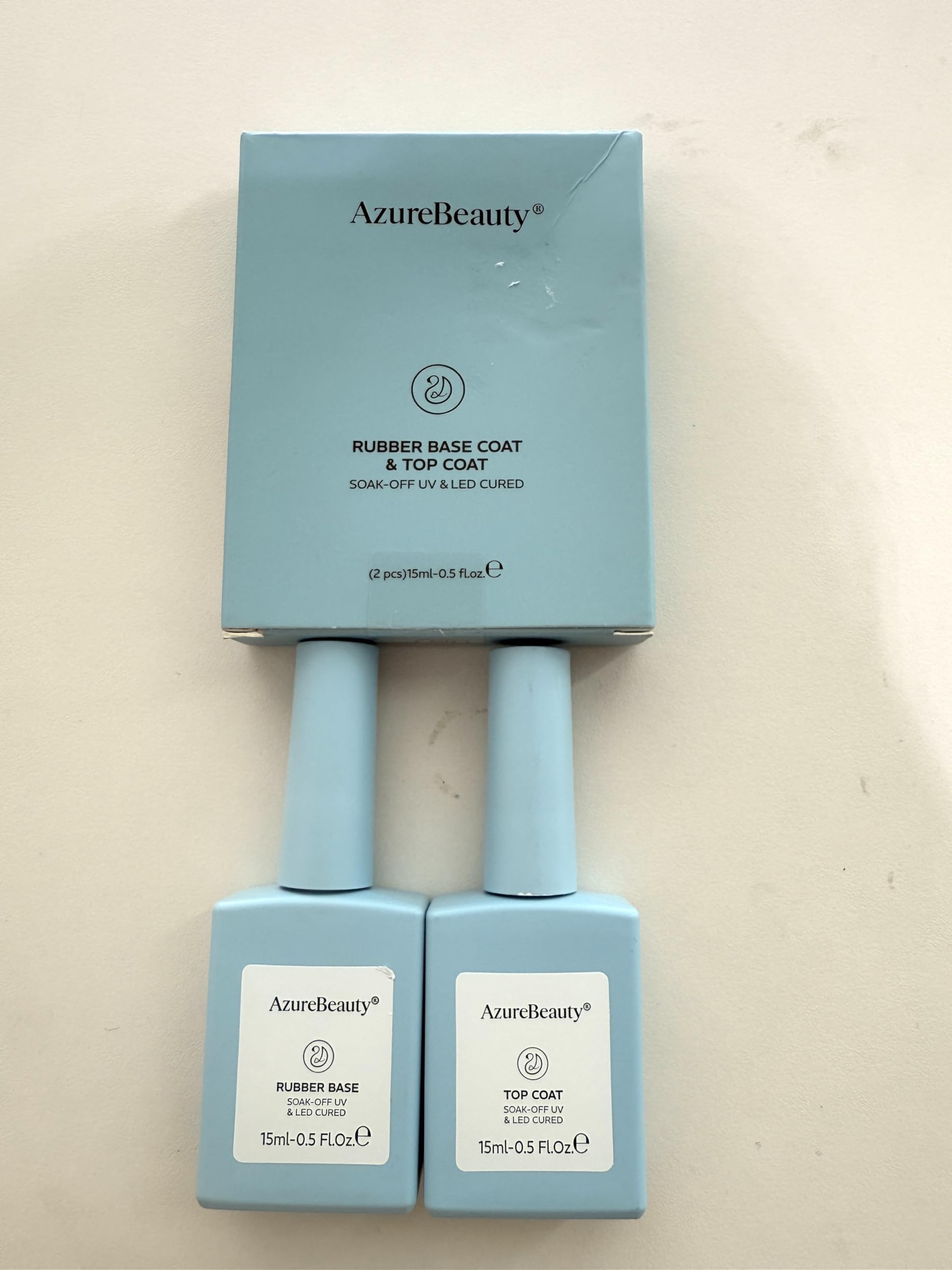 AZUREBEAUTY finished glossy nails lifestyle shot showing mirror shine