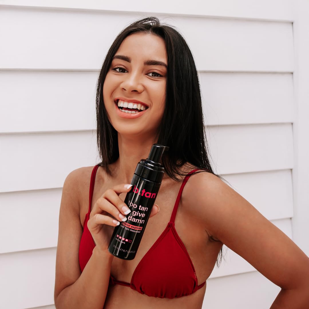 B.TAN bottle in a beach bag showing travel-ready tanning option