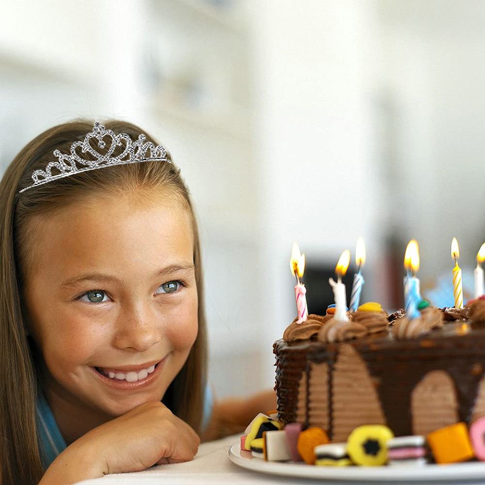 Baaxxango tiara in hand showing size and lightweight comfort advantage