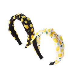 BaBakiak front view showing two lemon headbands and playful summer style