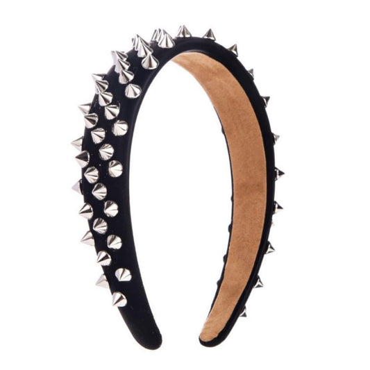 BaBakiak front view of studded headband showing bold black spikes and edgy style benefit