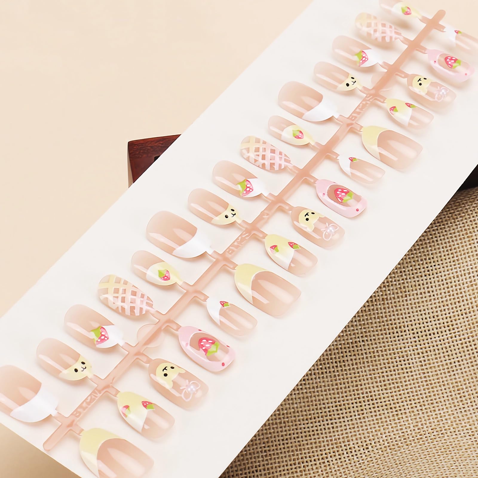 BABALAL close-up of bear and strawberry designs, cute detail appeal