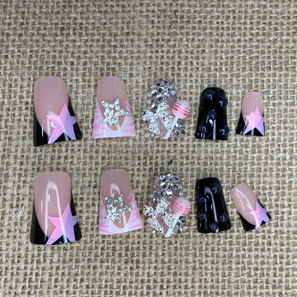 BABALAL star and bow charm detail showing decorative bling for standout nails