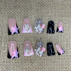 BABALAL star and bow charm detail showing decorative bling for standout nails