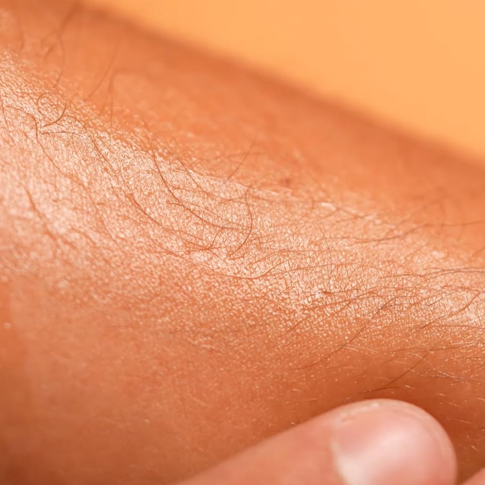 Babaria being applied on arm demonstrating even spread and glow