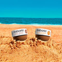 Babaria in beach setting conveying waterproof use and lifestyle benefit