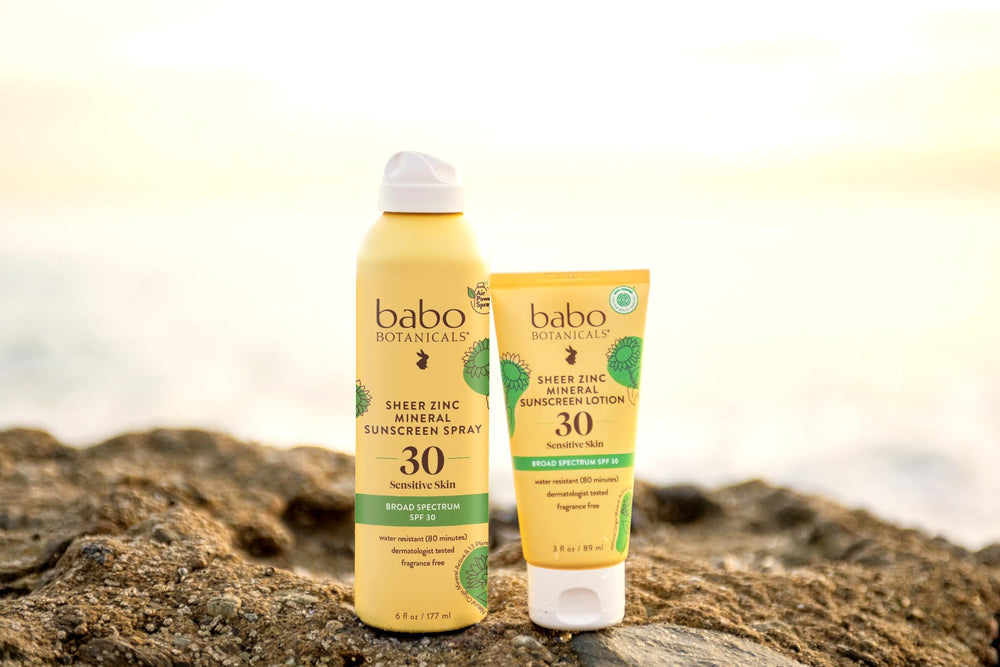Babo Botanicals 2-pack on beach towel highlighting family-ready supply