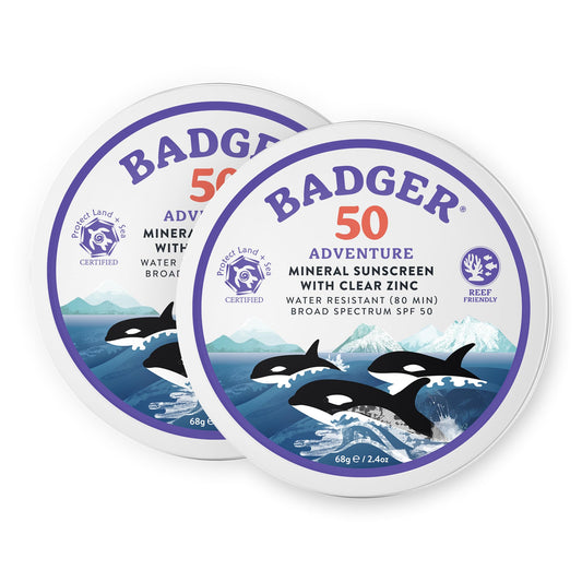 Badger tin front label showing SPF 50 and reef-safe benefit