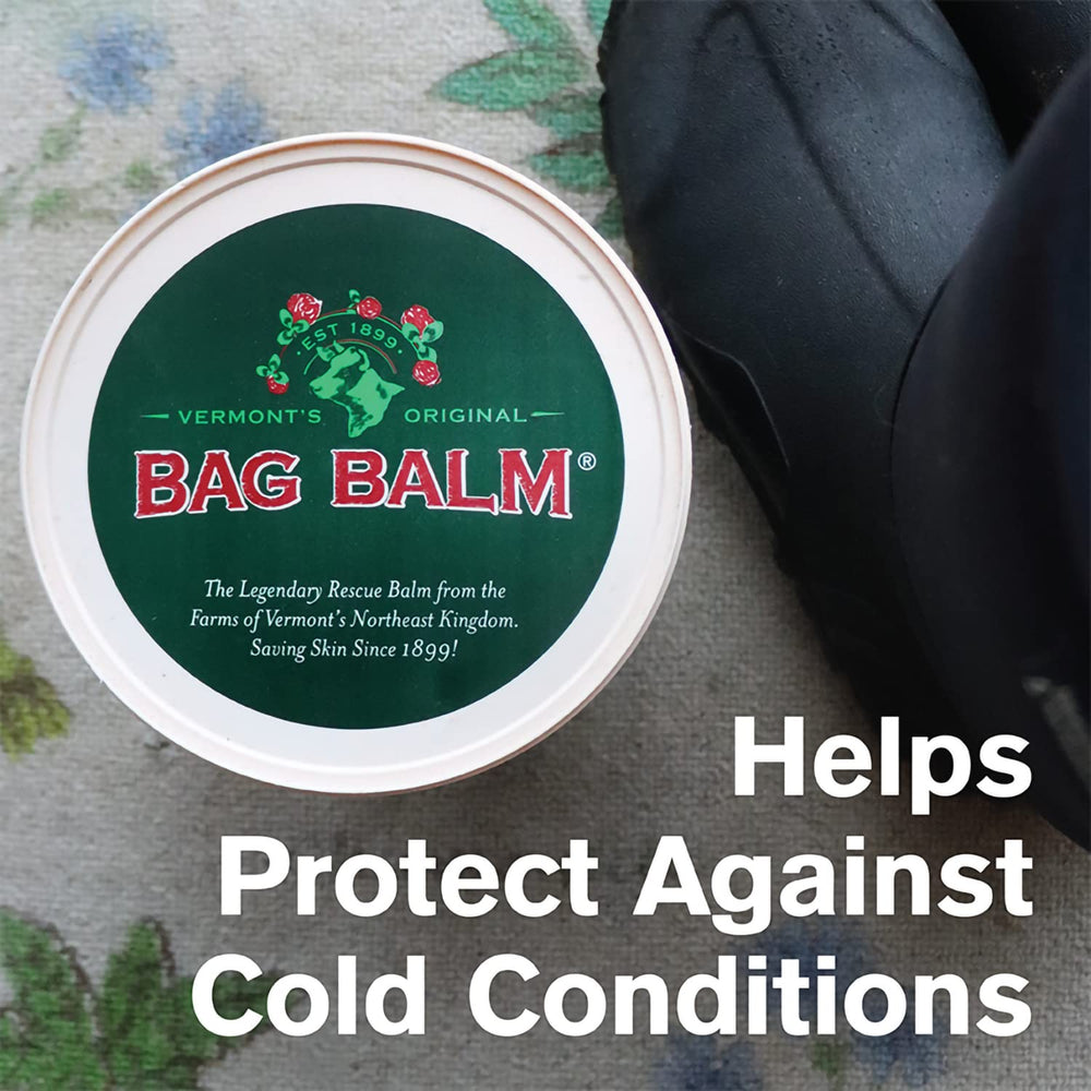 Applying Bag Balm to dry hands demonstrating brand restoring skin softness