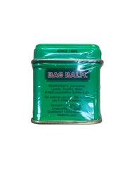 Bag Balm cream dollop on fingertip highlighting rich texture and deep hydration