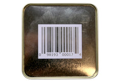 Close-up of Bag Balm open tin texture demonstrating rich, spreadable balm
