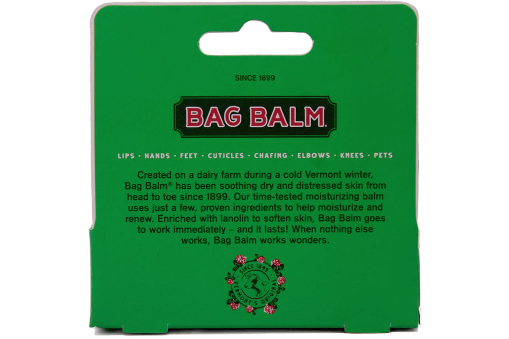 Size comparison showing Bag Balm 8 oz tin beside 0.33 oz tube for scale