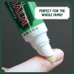 Bag Balm size comparison in hand illustrating compact 0.33 oz tubes