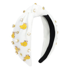 BAHABY front view of headband showcasing banana motifs and knot, playful accent