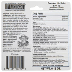 Balmshot ingredients laid out showing beeswax, aloe, vitamin E and natural oils